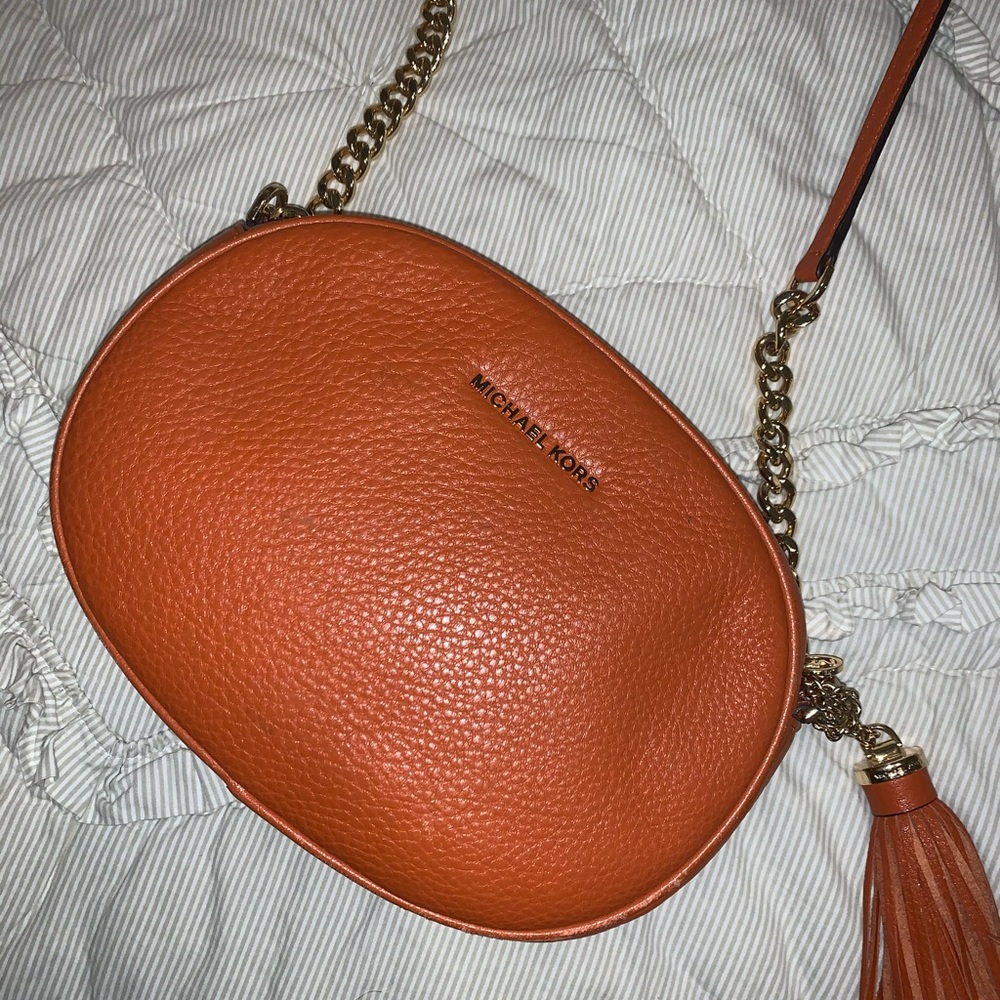 Michael Kors round orange purse